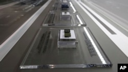 FILE - Samsung Electronics' microchips are displayed at its shop in Seoul, South Korea, Jan. 31, 2018. 