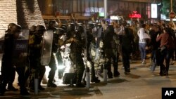 Riot police intervene after a protest turned violent in Skopje, Macedonia, April 13, 2016. Opposition supporters gathered in the capital for a second day to demand the resignation of President Gjorge Ivanov over pardons in a wiretapping probe.