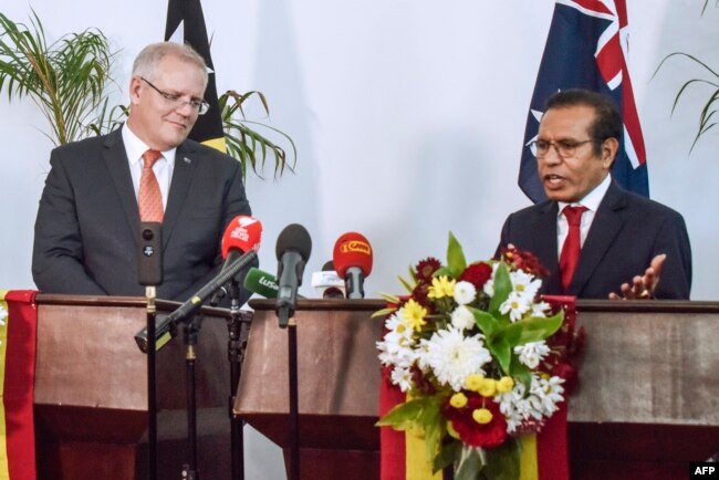 Perdana Menteri Timor Leste Taur Matan Ruak (kanan) dan Perdana Menteri Australia Scott Morrison (kanan) menghadiri konferensi pers bersama di Dili, 30 Agustus 2019. (Foto: AFP)
