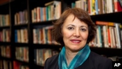 FILE - This undated photo made available by Amanda Ghahremani, shows retired Iranian-Canadian professor Homa Hoodfar. 