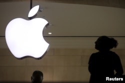 FILE - The Apple logo is pictured at Grand Central Terminal in the Manhattan borough of New York, Feb. 21, 2016.