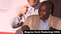 South Sudanese veteran journalist Alfred Taban addresses the crowd at the launch of the new VOA transmitter in Juba, South Sudan, on Thursday March 21, 2013. (VOA/Mugume Davis Rwakaringi)