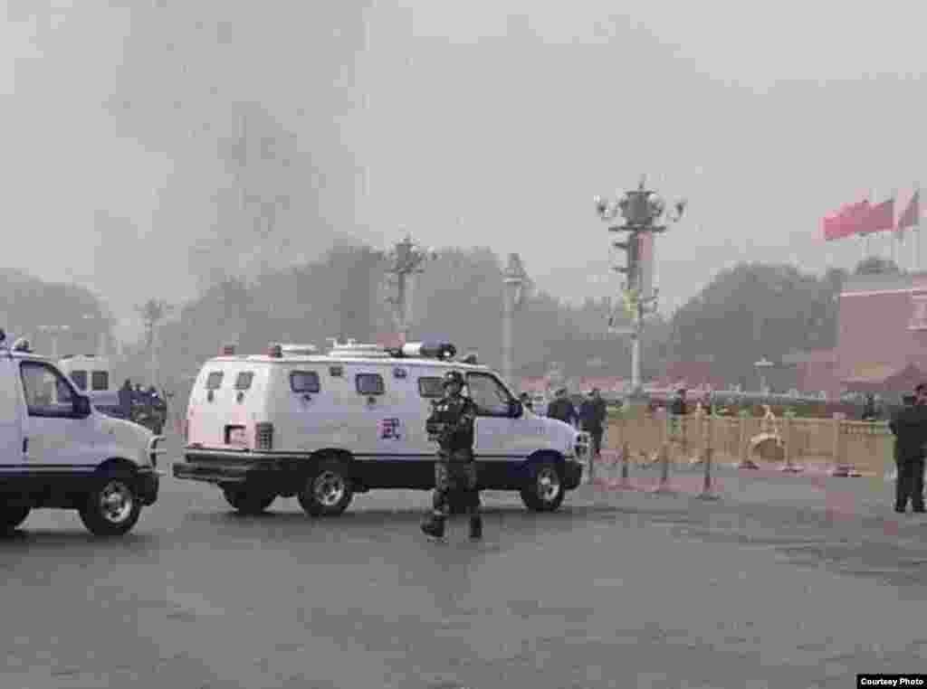 Security it seen after a car accident at Tiananmen Square in Beijing, Oct. 28, 2013. (Image taken from weibo)