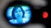 Syrian National Council representative, spokeswoman Basma Kodmani seen through a TV camera viewfinder answers a question during a news conference in Moscow, Russia, Tuesday, July 10, 2012. 