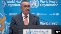 FILE - This handout picture made available by the World Health Organization on Nov. 29, 2021, shows WHO Director-General Tedros Adhanom Ghebreyesus addressing a special session of the World Health Assembly in Geneva. 