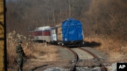 A South Korean train transporting South Korean officials runs on rails that lead to North Korea inside the demilitarized zone separating the two Koreas in Paju, South Korea, Nov. 30, 2018.