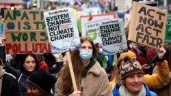 Climate activists protest in the streets of London, Nov. 6, 2021