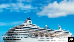 FILE - The cruise liner Crystal Symphony leaves the harbor in Charleston, South Carolina, May, 21, 2013. Scheduled to dock in Florida Jan. 22, 2022, the ship, was diverted to the Bahamas after a U.S. judge granted an order to seize the vessel.