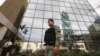 A police officer stands guard outside the Mossack Fonseca law firm office in Panama City, April 12, 2016.