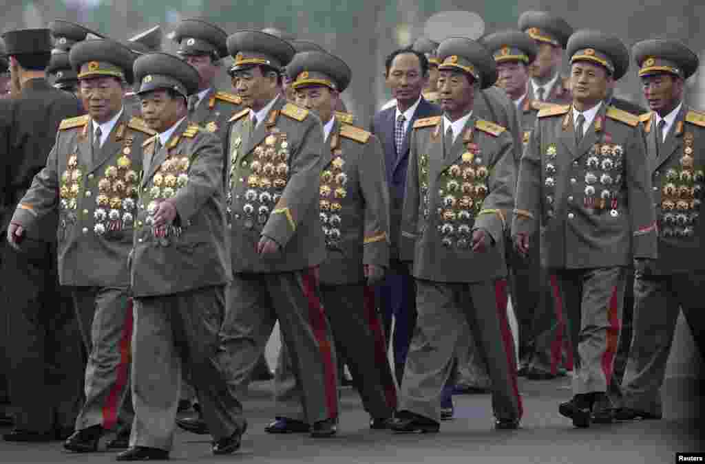 North Korean senior military officials arrive for the opening ceremony of the cemetery for fallen fighters of the Korean People&#39;s Army in Pyongyang, July 25, 2013. 
