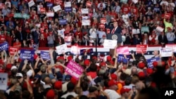 President Donald Trump gives a thumbs up as he speaks during a campaign rally Monday, Nov. 5, 2018, in Cape Girardeau, Missouri. 