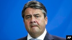 FILE - In this June 29, 2015 file picture Vice Chancellor and Economy Minister Sigmar Gabriel briefs the media, at the chancellery in Berlin. 