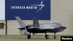 A RAF Lockheed Martin F-35B fighter jet taxis along a runway after landing at the Royal International Air Tattoo at Fairford, Britain, July 8, 2016. 