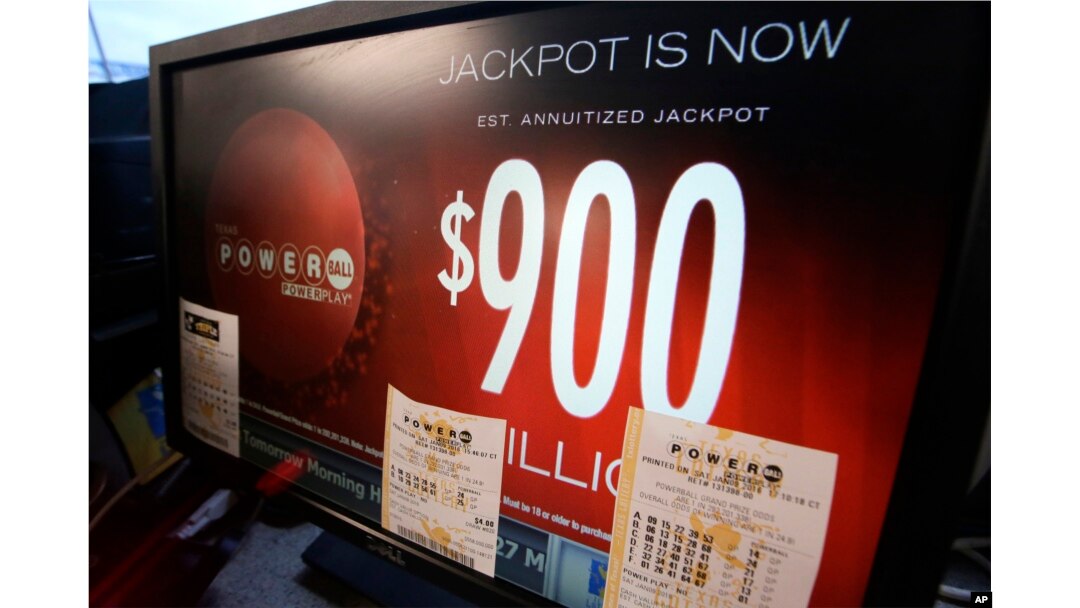 A sign displays the estimated Powerball lottery jackpot amount at a gas station in Dallas, Texas, Jan. 9, 2016.