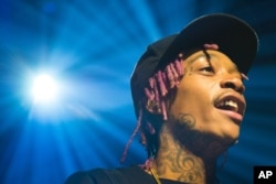 Recording artist Wiz Khalifa performs in concert at Webster Hall, Nov. 16, 2014, in New York.