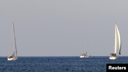 A small flotilla of three sailing boats carrying pro-Palestinian activists that media reports say will try to challenge Israel's sea blockade of the Gaza Strip, in the open sea near Plaka on the island of Crete, Greece, June 26, 2015.