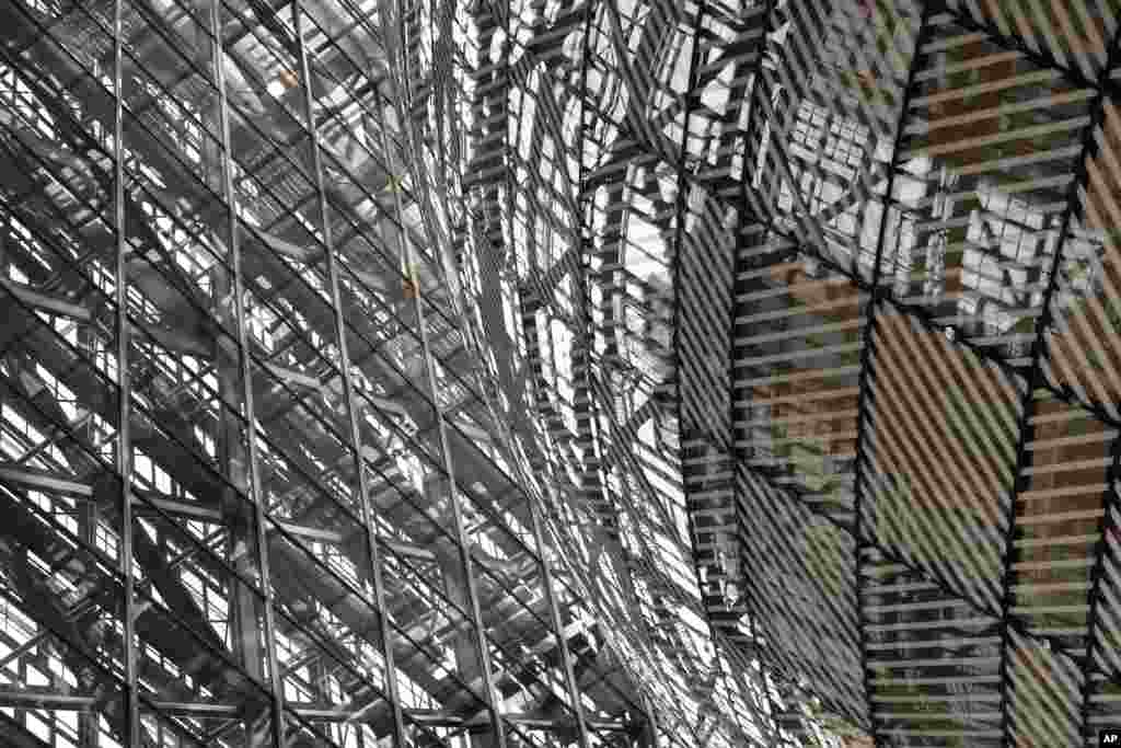 Light is reflected in the glass of the atrium at the Europa building during an EU-ASEM summit in Brussels, Belgium.