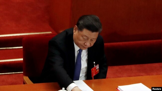 中國國家主席習近平在全國人大會議就港版國安法進行表決時按下贊成鍵。(2020年5月28日)