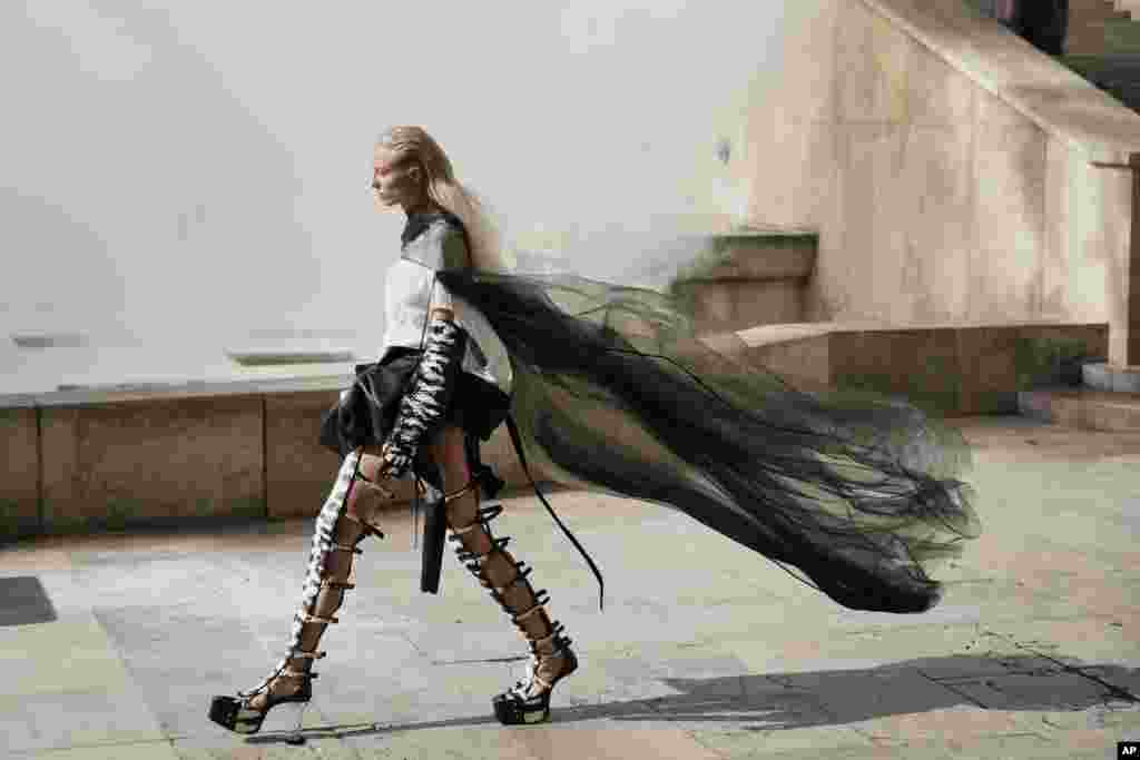 A model wears a creation for Rick Owens&#39; Spring-Summer 2022 ready-to-wear fashion show presented in Paris, France.