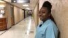 Christina Jones works full time as a housekeeper at a hospital in Jonesboro, Ark. The state's new minimum wage law will be implemented over three years, meaning Jones' salary will go up in 2021. Photo taken Dec. 3, 2018. (T.Krug/VOA)