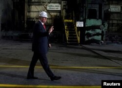 U.S. President Donald Trump tours the Granite City Works hot strip steel mill in Granite City, Illinois, U.S., July 26, 2018.