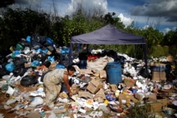 Sirqueira works in waste recycling. She lives near Planalto Palace in Brasilia. (REUTERS/Adriano Machado)