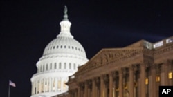 FILE - In this April 7, 2011, file photo the U.S. Capitol in Washington is illuminated at night as Congress work late to avert a government shutdown. The legislative branch of the world's most powerful nation is now widely scorned as it lurches from one n