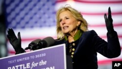 FILE - Jill Biden, wife of President-elect Joe Biden, speaks during a drive-in rally at Heinz Field, Monday, Nov. 2, 2020, in Pittsburgh, Pennsylvania. (AP Photo/Andrew Harnik)