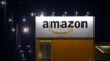 FILE - The logo of Amazon is seen at the company logistics center in Lauwin-Planque, France, Feb. 20, 2017. 