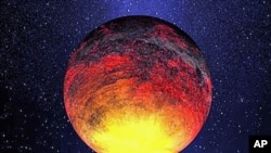 This is an artist rendering provided by NASA one of the smallest planets that Kepler has found - a rocky planet called Kepler-10b - that measures 1.4 times the size of Earth and where the temperature is more than 2,500 degrees Fahrenheit, January 2011