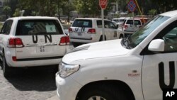 8月26日﹐聯合國化學武器檢查員乘搭的車輛離開酒店前往懷疑發生化武襲擊的地點