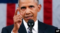 President Barack Obama, delivering his State of the Union address before a joint session of Congress on Capitol Hill in Washington, urged Americans to “reject any politics that target people because of race or religion,” Jan. 12, 2016.