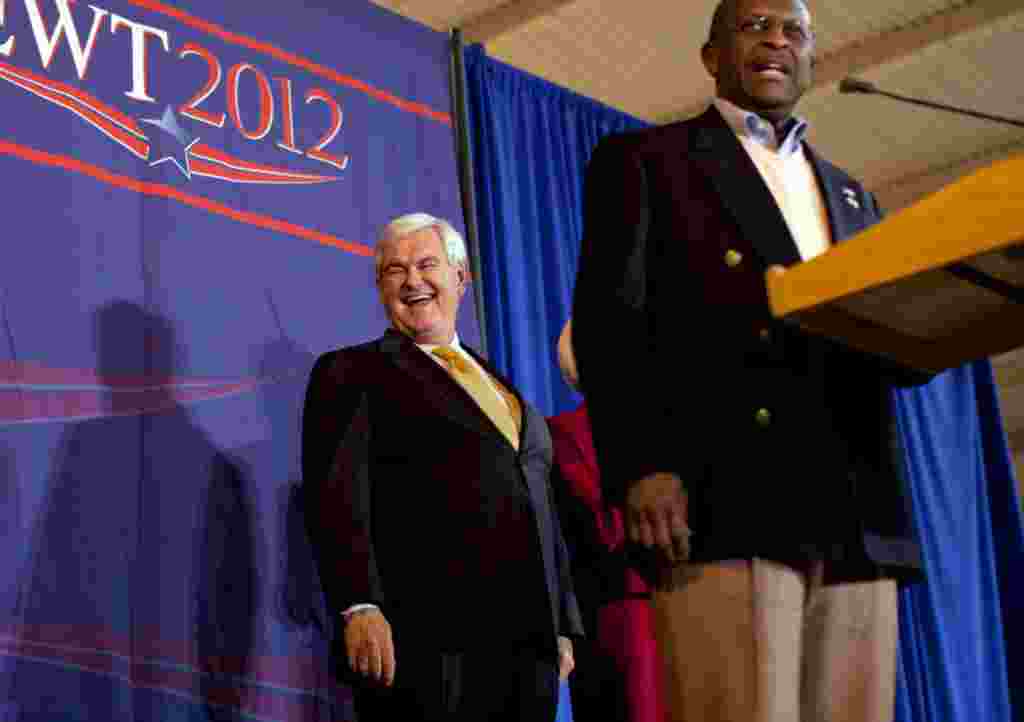 Mantan bakal calon, Herman Cain, berbicara menyampaikan dukungannya bagi kampanye Newt Gingrich di Chattanooga, Tennessee, 5 Maret (AP).