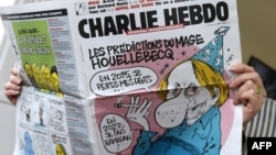 Số mới nhất của tờ báo trào phúng Charlie Hebdo của Pháp với hình biếm họa chế nhạo thủ lãnh Nhà nước Hồi giáo.