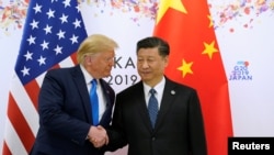 资料照：美国前总统特朗普与中国领导人习近平在日本大阪G20峰会期间举行双边会晤。（2019年6月29日）