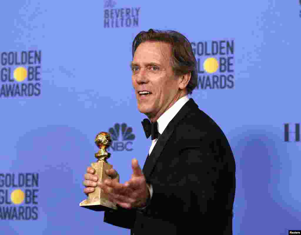 Hugh Laurie holds the award for Best Performance by an Actor in a Supporting Role in a Series, Limited Series or Motion Picture Made for Television for his role in "The Night Manager" during the 74th Annual Golden Globe Awards in Beverly Hills, California