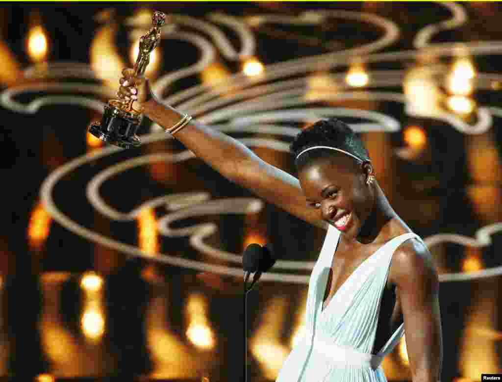 Lupita Nyong'o, best supporting actress winner for her role in "12 Years a Slave", speaks on stage at the 86th Academy Awards in Hollywood, CA. March 2, 2014.