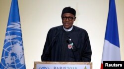 Le président du Nigeria, Muhammadu Buhari, délivre un discours à la conférence internationale sur le climat à Paris (COP21) au Bourget, 30 novembre 2015. 