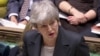 Britain's Prime Minister Theresa May speaks in Parliament, in London, March 20, 2019, in this screen grab taken from video. 