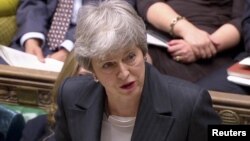 Britain's Prime Minister Theresa May speaks in Parliament, in London, March 20, 2019, in this screen grab taken from video. 