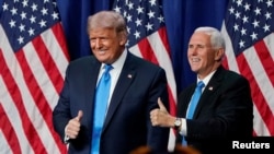 Bivši predsednik Donald Trump i njegov potpredskednik Mike Pence, arhivska fotografija