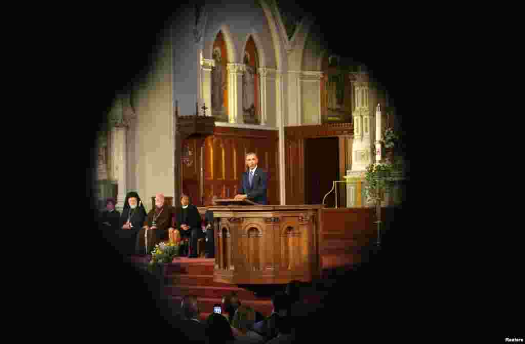 U.S. President Barack Obama speaks at an interfaith memorial service for the victims of the bombing at the Boston Marathon at the Cathedral of the Holy Cross in Boston, Massachusetts, April 18, 2013. 