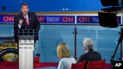 FILE - Republican presidential candidate, New Jersey Gov. Chris Christie responds to a question during the Republican presidential debate, Sept. 16, 2015. Christie has been removed from the next debate because of low polling numbers.