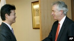 U.S. Deputy Secretary of State William Burns, right, shakes hands with Japan's Foreign Minister Koichiro Gemba, prior to their meeting in Tokyo, Monday, Oct. 15, 2012. (AP Photo/Koji Sasahara)