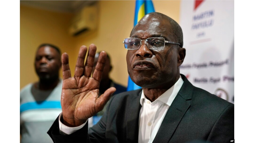 Opposition candidate Martin Fayulu speaks to the press at his headquarters in Kinshasa, Congo, Jan. 10, 2019.