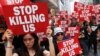 Thousands Wear Black, Rally to Demand Hong Kong Leader Goes