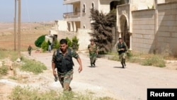 Forces loyal to Syria's President Bashar al-Assad are on the move June 3, 2013, in what the government said was an operation against rebels in the Aleppo countryside.