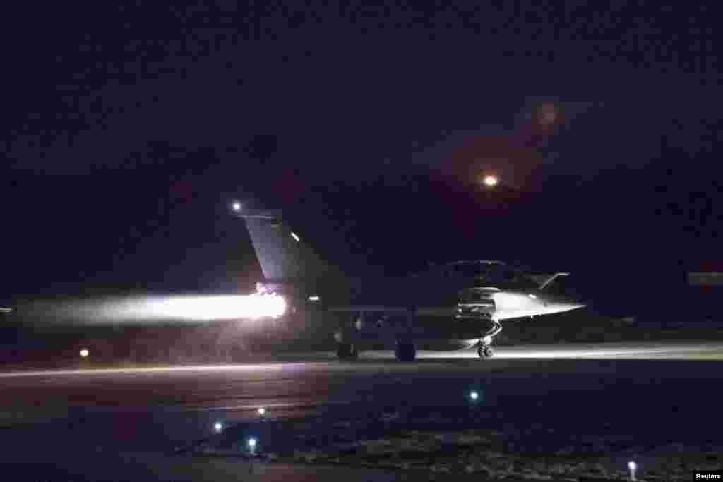 A plane preparing to take off as part of the joint airstrike operation by the British, French and U.S. militaries in Syria, in this picture obtained on April 14, 2018 via social media.