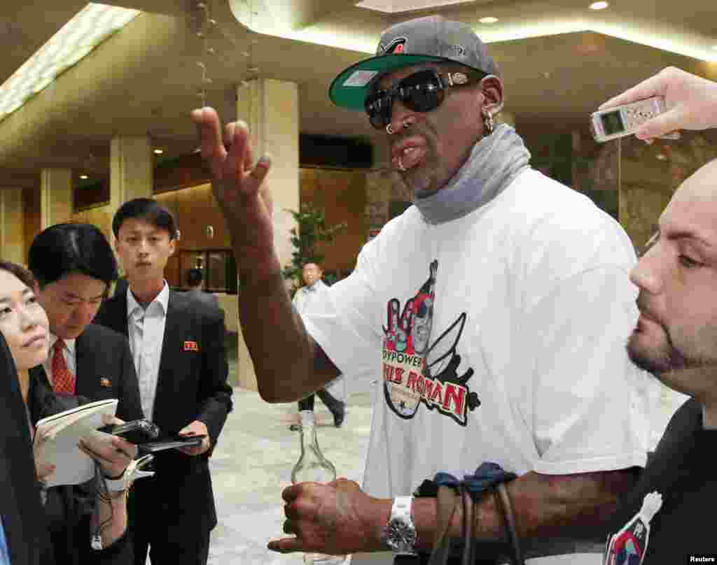 Former basketball star Dennis Rodman answers a reporter&#39;s question at a hotel in Pyongyang, in this photo taken by Kyodo. North Korean leader Kim Jong-un again met Rodman during his second visit to North Korea this year, North Korea&#39;s state news agency said.