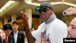 Dennis Rodman answers a reporter's question at a hotel in Pyongyang, in this photo taken by Kyodo, Sept. 7, 2013.
